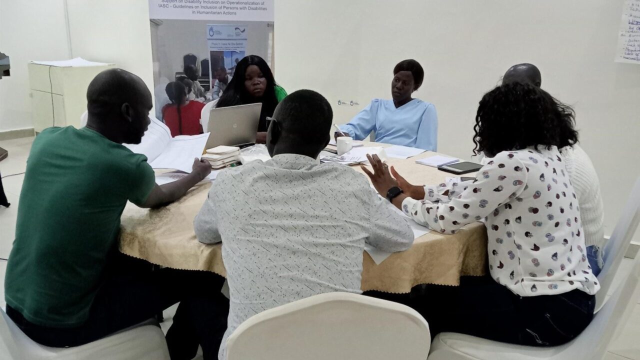 Training participants discussing during group work session.